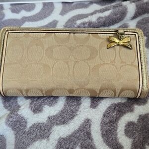 Elegant Tan Wallet with Gold Accents, Coach, Used